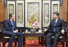 习近平会见英国前首相卡梅伦