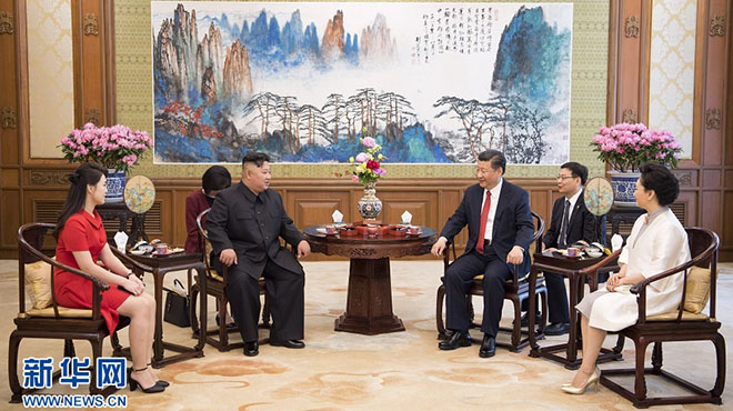 习近平会见朝鲜劳动党委员长金正恩