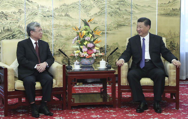 习近平会见越共中央政治局委员、中央书记处常务书记陈国旺